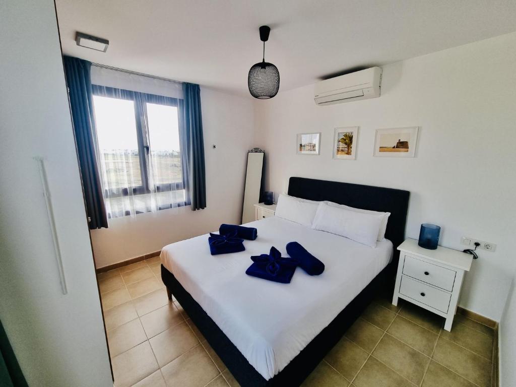 Postel nebo postele na pokoji v ubytování Casa Atlantida
