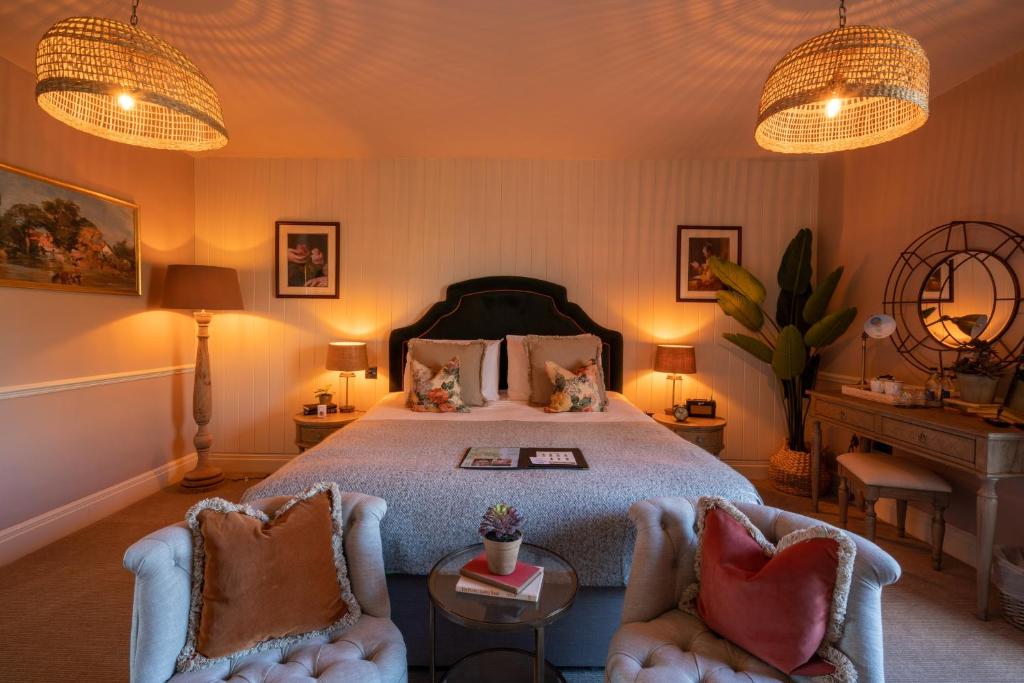 Uma cama ou camas num quarto em Prince of Burford