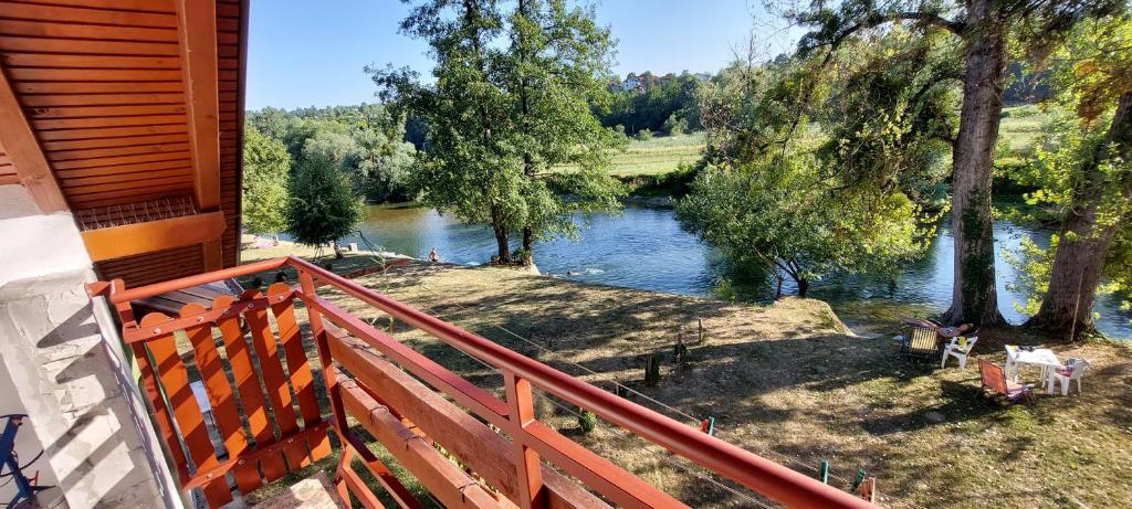 a view of a river from a balcony of a house at Odmor na Sani in Zolaći