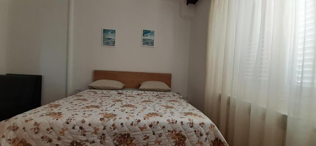 Posteľ alebo postele v izbe v ubytovaní Apartments Dida moj