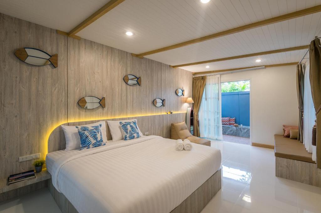 Postel nebo postele na pokoji v ubytování Aonang sealight pool villa
