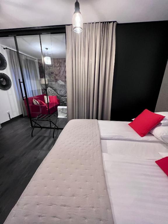 Postel nebo postele na pokoji v ubytování Global Home - Aparthotel - No Contact Check In