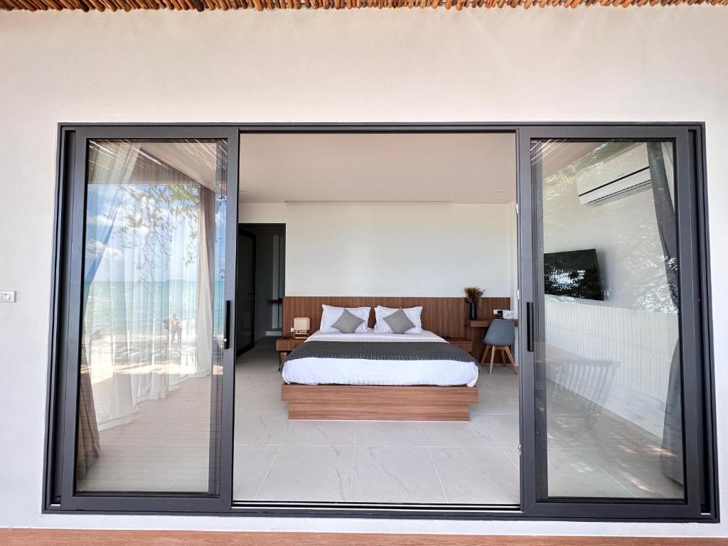 Postel nebo postele na pokoji v ubytování Rajapruek Samui Resort - SHA Plus