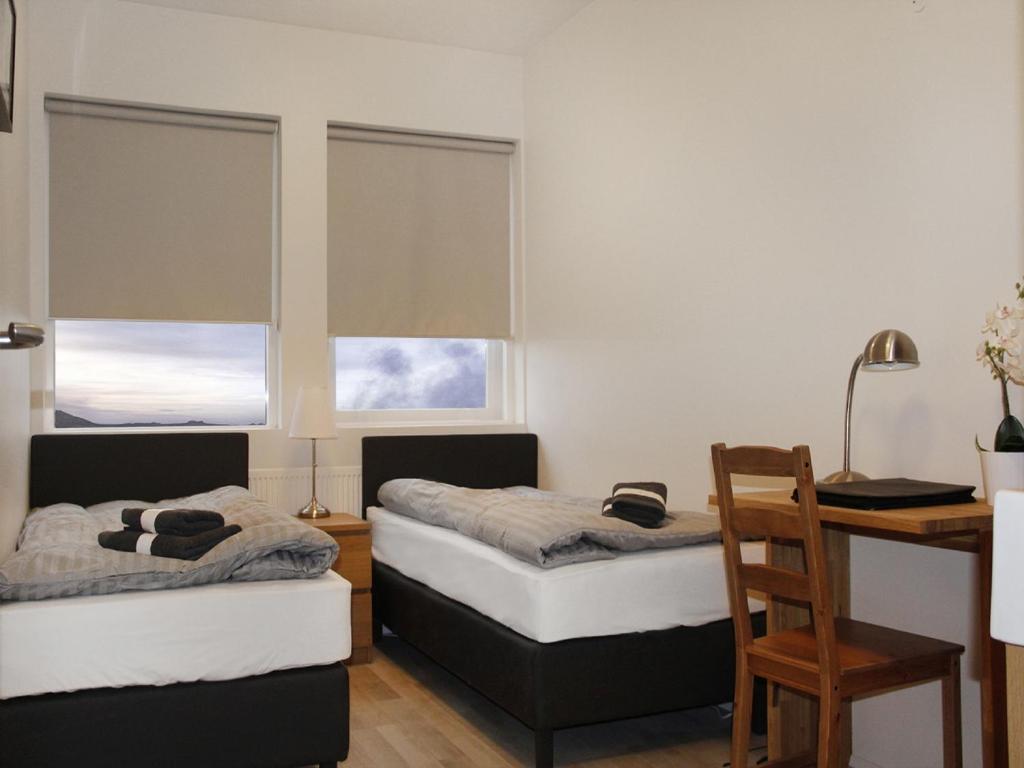 Postel nebo postele na pokoji v ubytování KEF Guesthouse by Keflavík airport