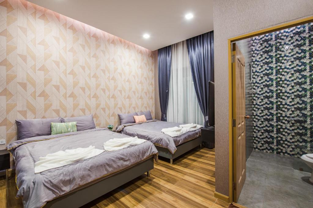 Postel nebo postele na pokoji v ubytování Laboon Pool Villa บ้านพักส่วนตัวพร้อมสระว่ายน้ำ ชะอำ