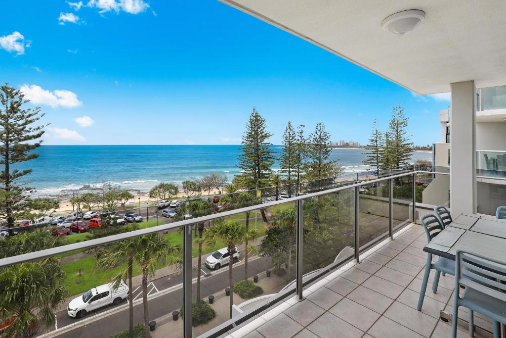 a balcony with a view of the ocean at Spinnaker Beach Front in Mooloolaba