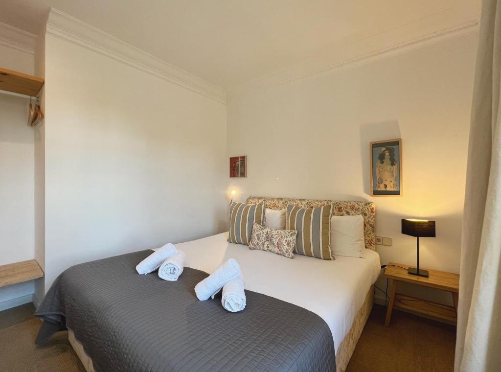 Postel nebo postele na pokoji v ubytování Stay U-nique Apartments Borbó