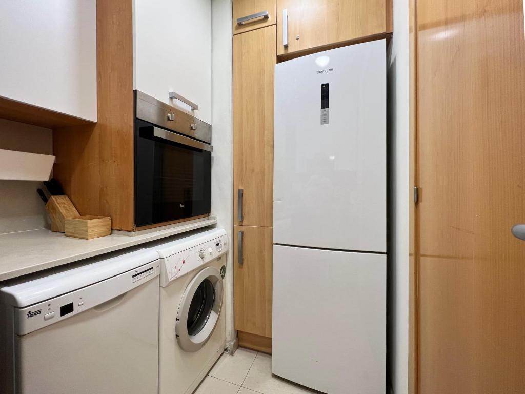 Kuchyň nebo kuchyňský kout v ubytování Stay U-nique Apartments Borbó