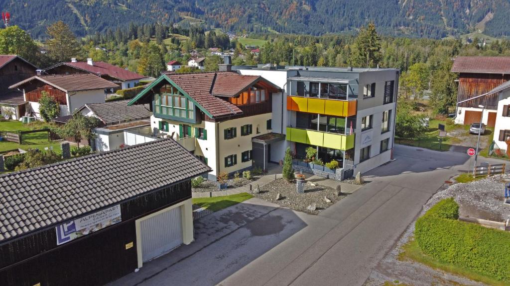 an aerial view of a house in a village at Alpenapart Singer - contactless check-in in Reutte