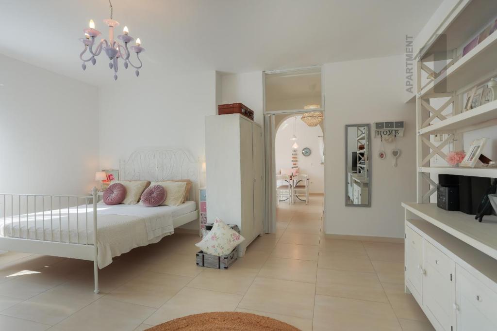 Postel nebo postele na pokoji v ubytování Apartments Kaya