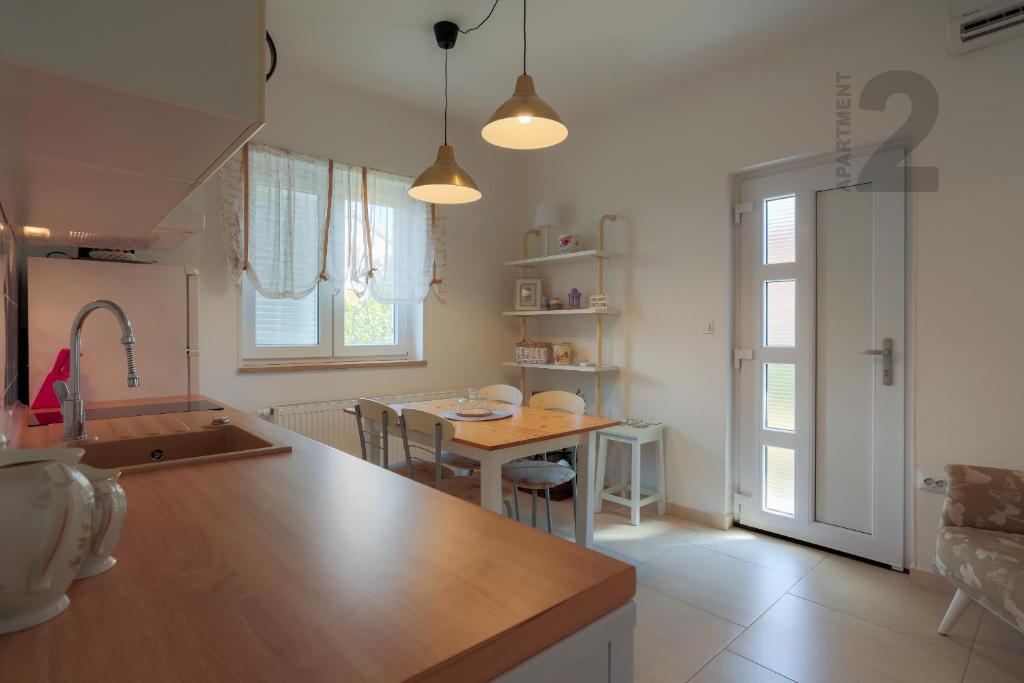 Kuchyň nebo kuchyňský kout v ubytování Apartments Kaya