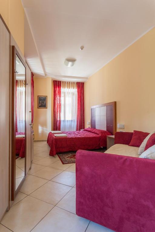 Postel nebo postele na pokoji v ubytování Hotel Conte Ruggero