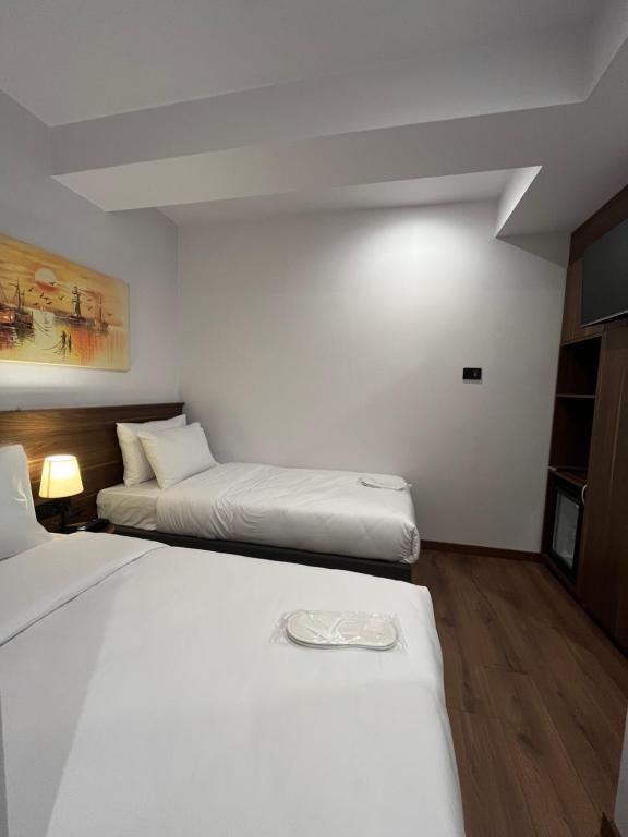 Postel nebo postele na pokoji v ubytování PALMERA HAGIA SOPHIA hotel