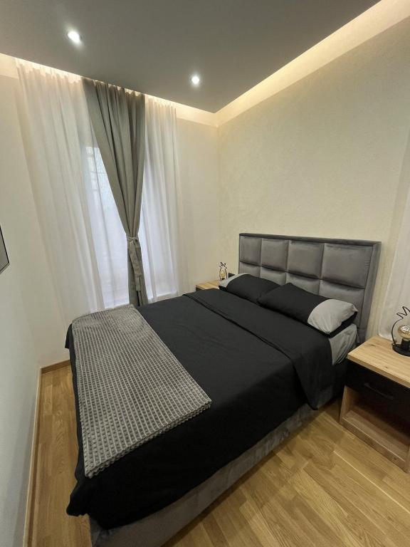 Una cama o camas en una habitación de Apartman Sara - DivčiNova