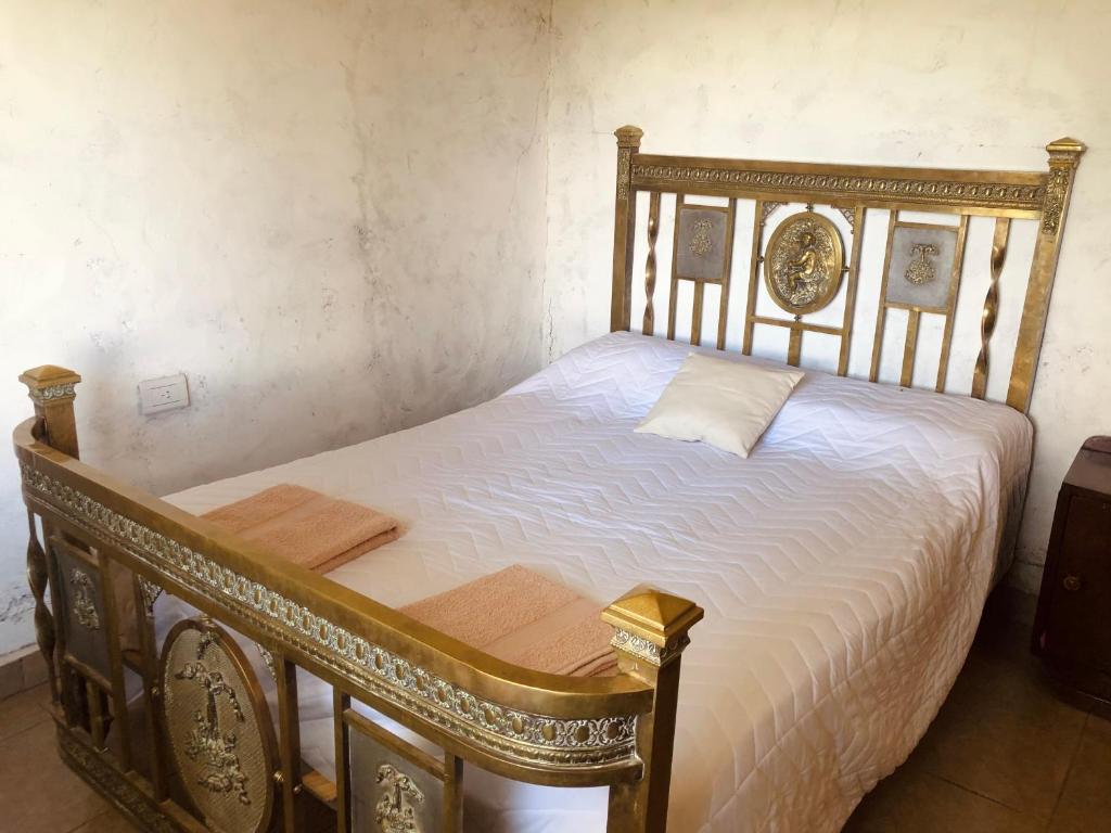 Postel nebo postele na pokoji v ubytování Matices de Molinos Hostal