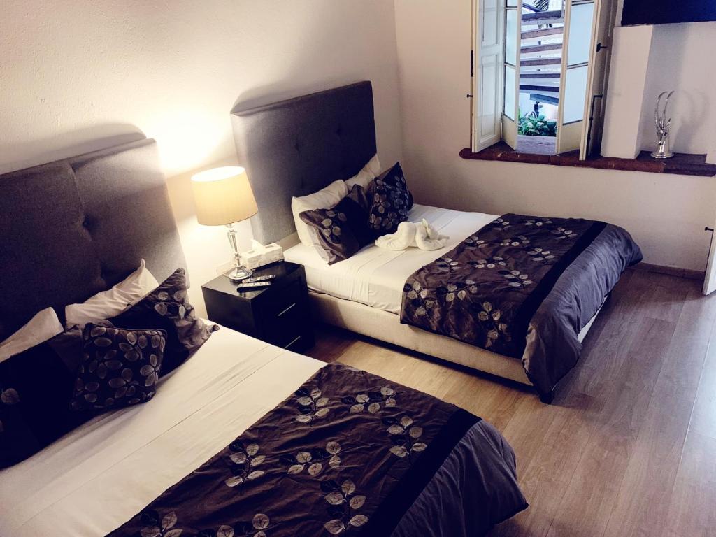Postel nebo postele na pokoji v ubytování M Hoteles Concepto