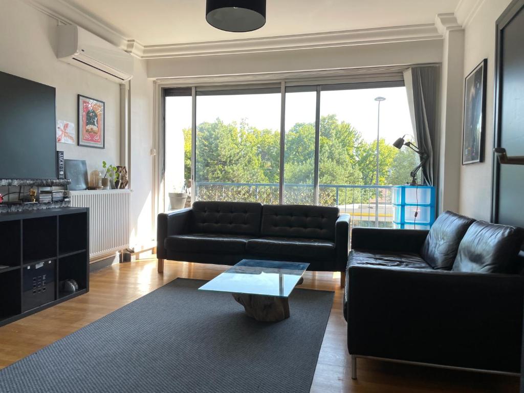 A seating area at Superbe appartement Grenoble idéalement situé