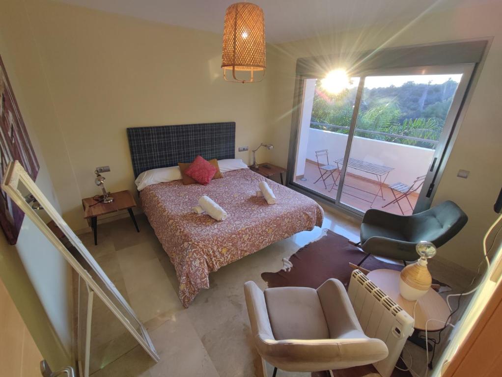 Posteľ alebo postele v izbe v ubytovaní Villa Aguilas Club Guest house
