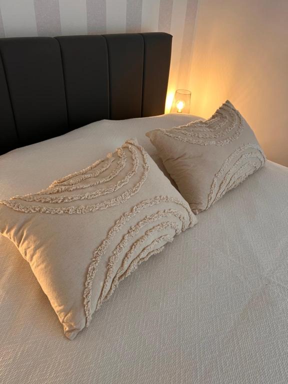Postel nebo postele na pokoji v ubytování Nirvana Lux Apartman Zlatar