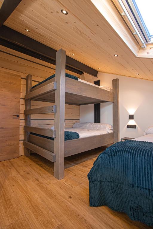 Posteľ alebo postele v izbe v ubytovaní APARTAMENTO BLOSSOM