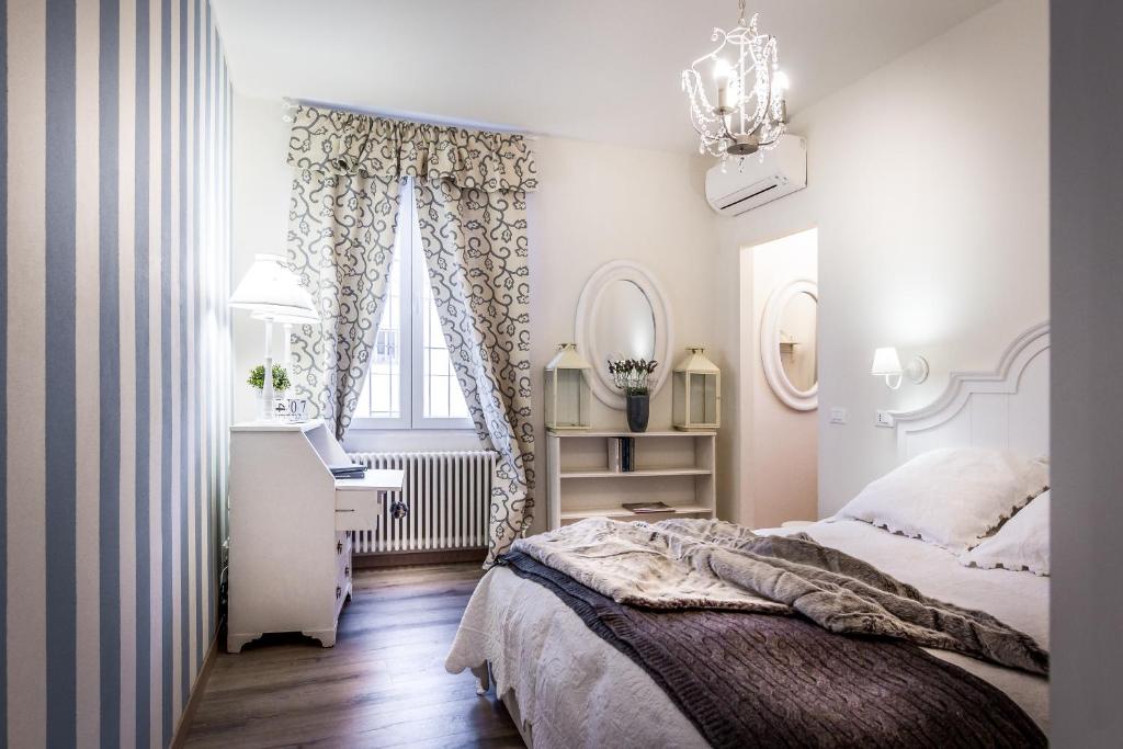 Posteľ alebo postele v izbe v ubytovaní Como Unique View - byMyHomeinComo
