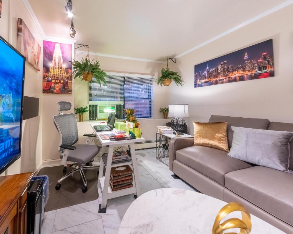a living room with a couch and a desk at Travel Nurse Housing & Internationals Travelers, College Student, Young Business Professionals - Corporate Housing Accommodation, Offsite Employee & Vacation Temporary Short-Terms Bookings in Brooklyn