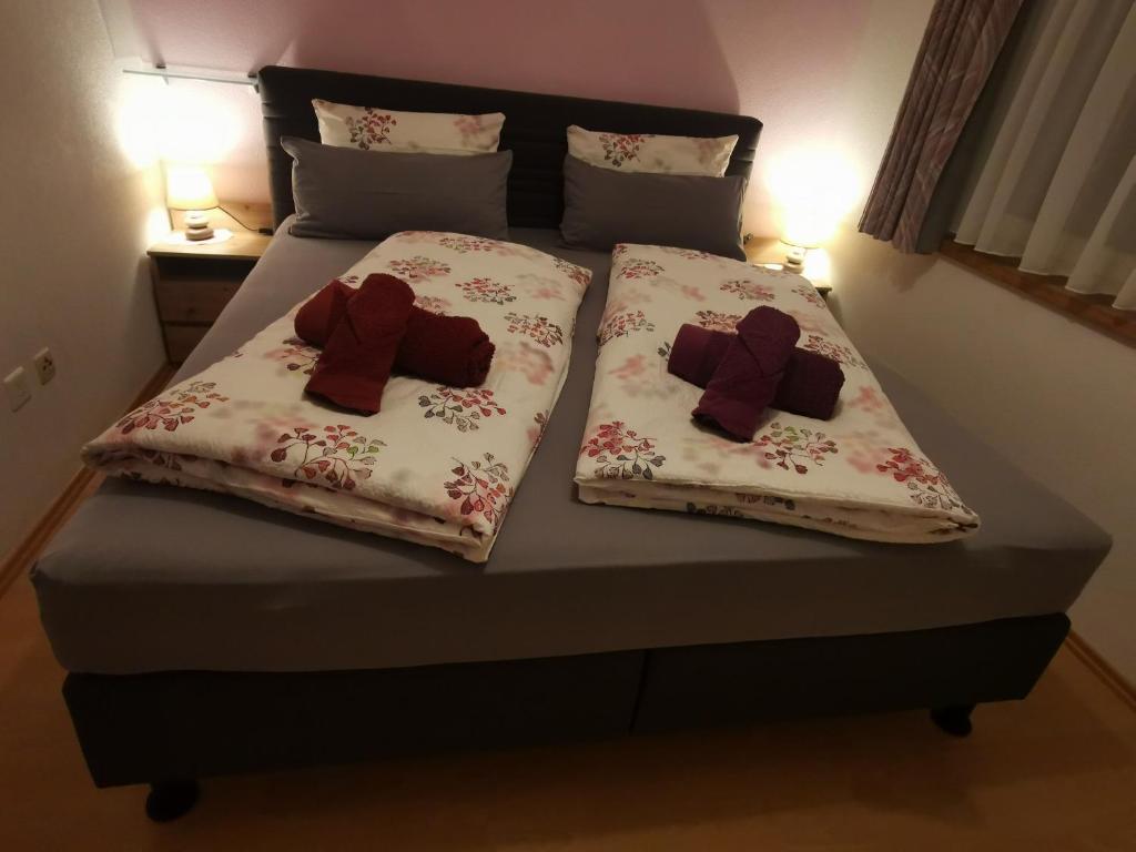 Postel nebo postele na pokoji v ubytování Ferienwohnung Aquileia