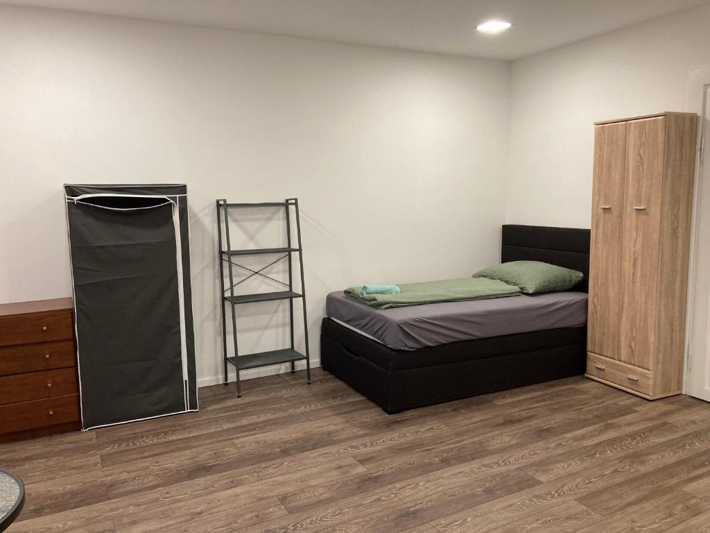 Posteľ alebo postele v izbe v ubytovaní Roland Apartment Zuglo 2