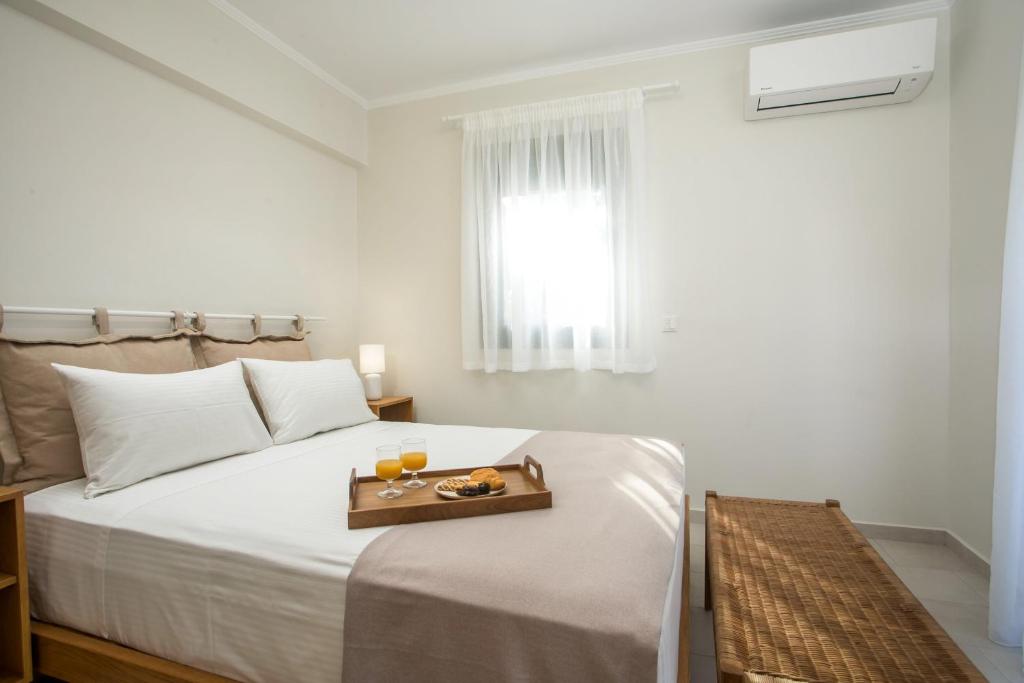 A bed or beds in a room at Beachfront Villa SeaShell Superior