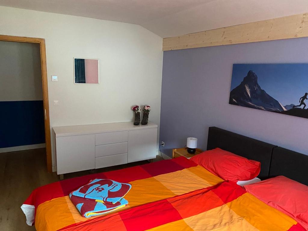 Postel nebo postele na pokoji v ubytování Spring Inn Apartments