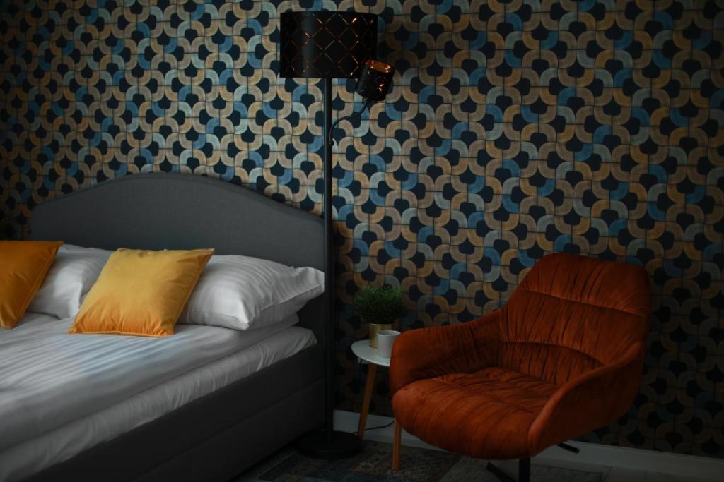 Posteľ alebo postele v izbe v ubytovaní Apartament Ażurowy