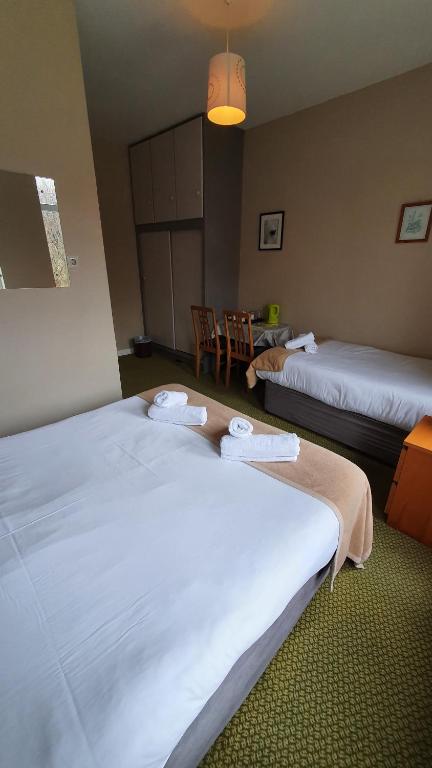 Postel nebo postele na pokoji v ubytování Portfinn Lodge