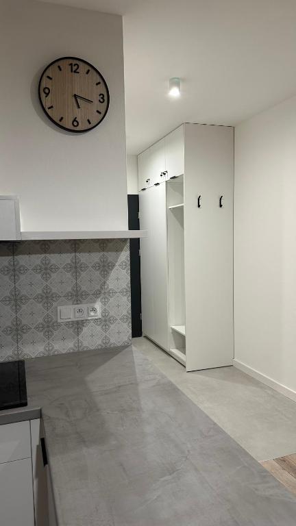 Kuchyňa alebo kuchynka v ubytovaní Apartamenty Mickiewicza40