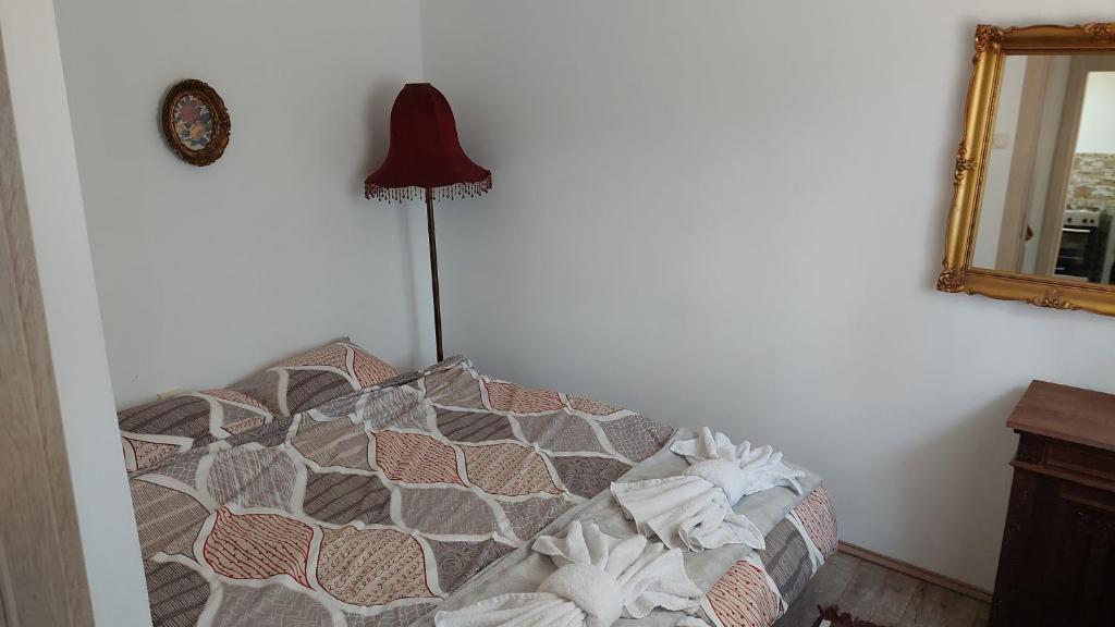 Postel nebo postele na pokoji v ubytování Divčibarski M.S.A. kutak