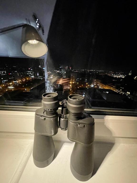 Fotografia z galérie ubytovania BLUE 3 metro WiFi 1 Gbs 75'TV Netflix Disney HBO Max AppleTV Amazon vo Varšave