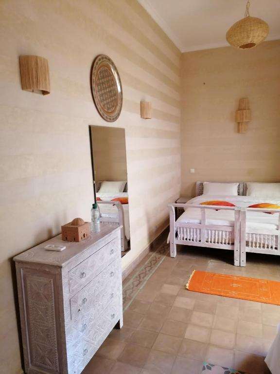 Postel nebo postele na pokoji v ubytování DAR MAR'OUKA , Maison d'hôtes