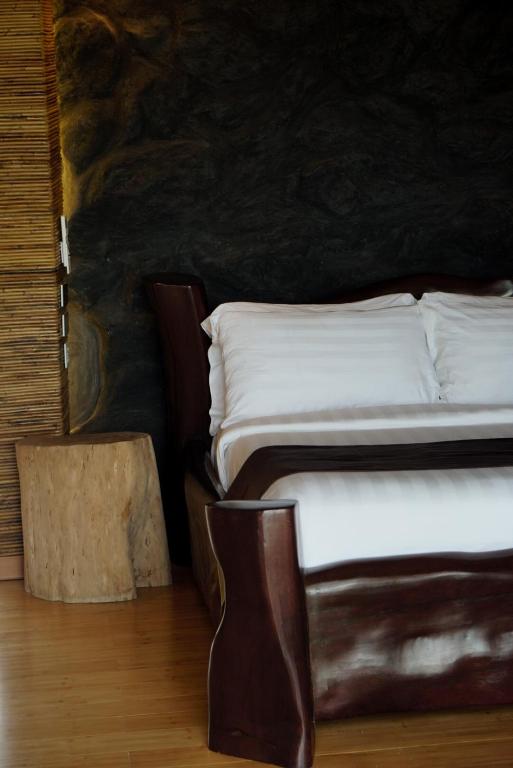 Postel nebo postele na pokoji v ubytování El Nido Bayview Resort