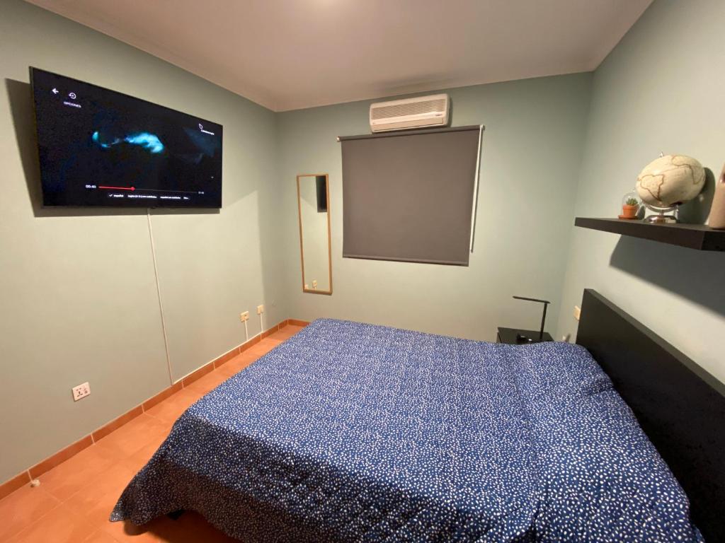 Postel nebo postele na pokoji v ubytování Villa Mogan Mall, con jacuzzi y PlayStation 5
