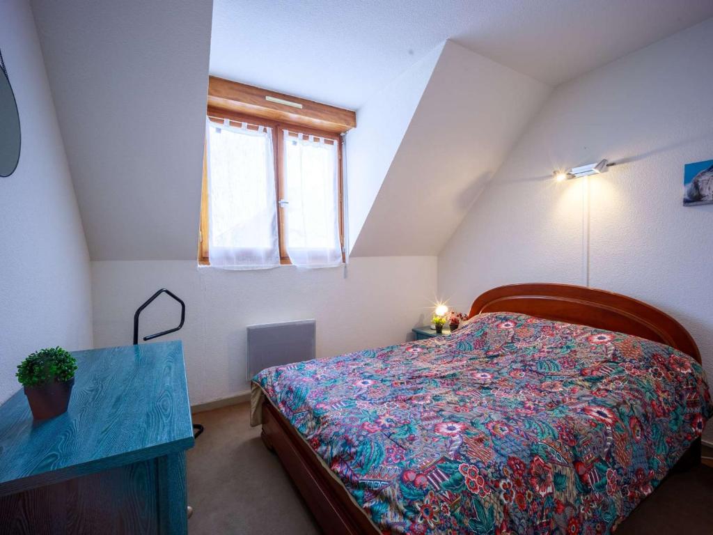 Posteľ alebo postele v izbe v ubytovaní Appartement 6 pers - Pieds des pistes, 2 chambres + Coin nuit, Exposition Sud - FR-1-296-454