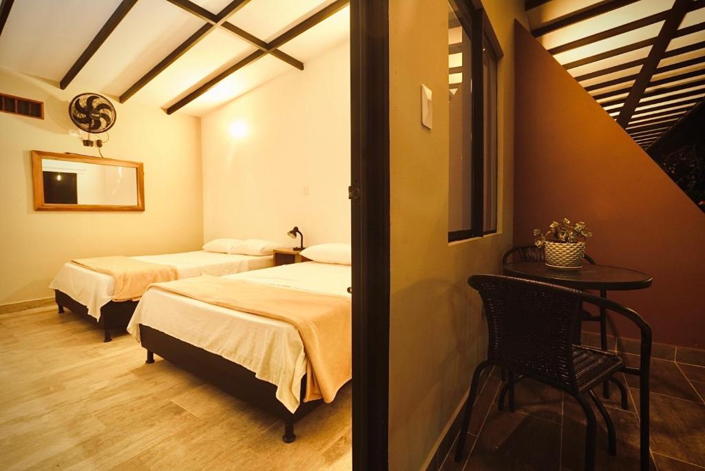 Una cama o camas en una habitación de Baum Hotel