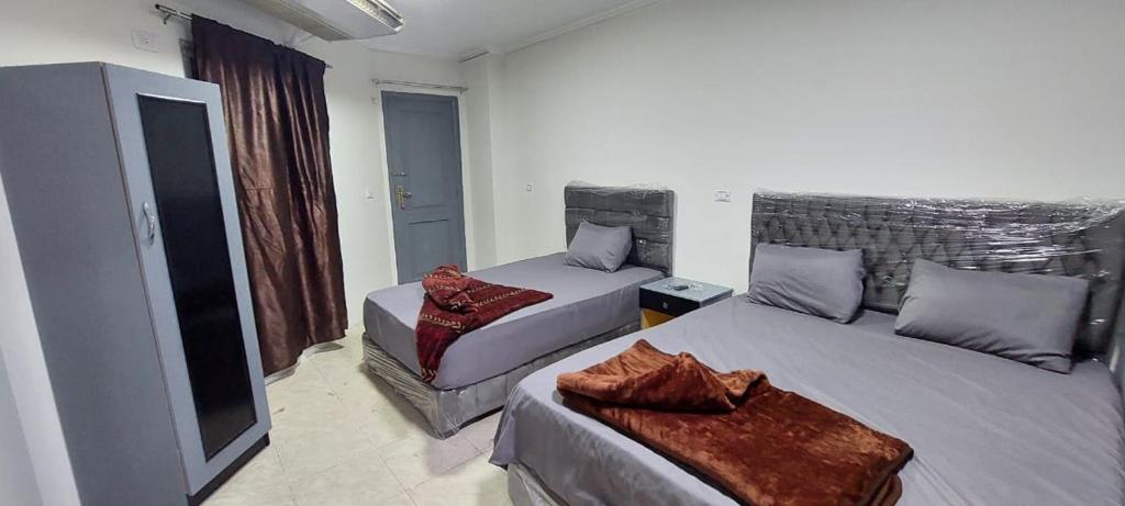 Postel nebo postele na pokoji v ubytování Best Dreams Hotel