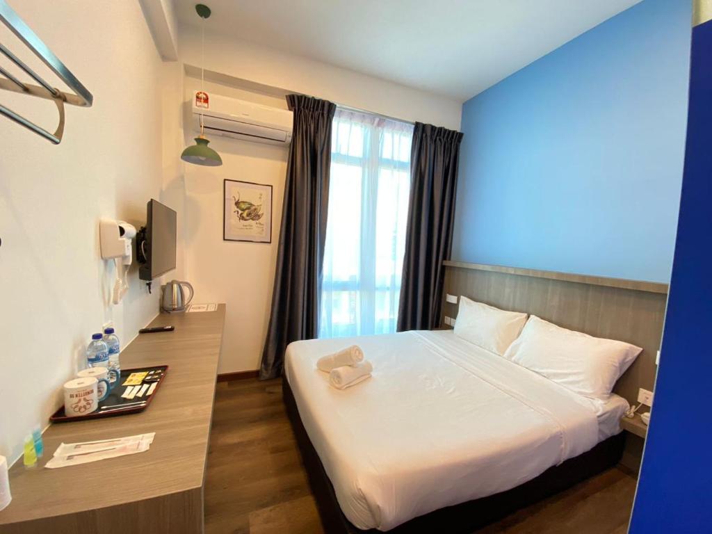 Postel nebo postele na pokoji v ubytování BENUTTEN 99 HOTEL