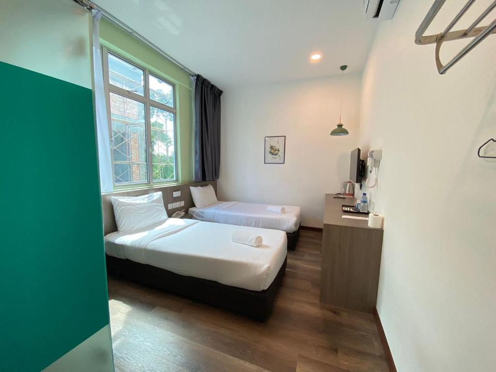 Postel nebo postele na pokoji v ubytování BENUTTEN 99 HOTEL