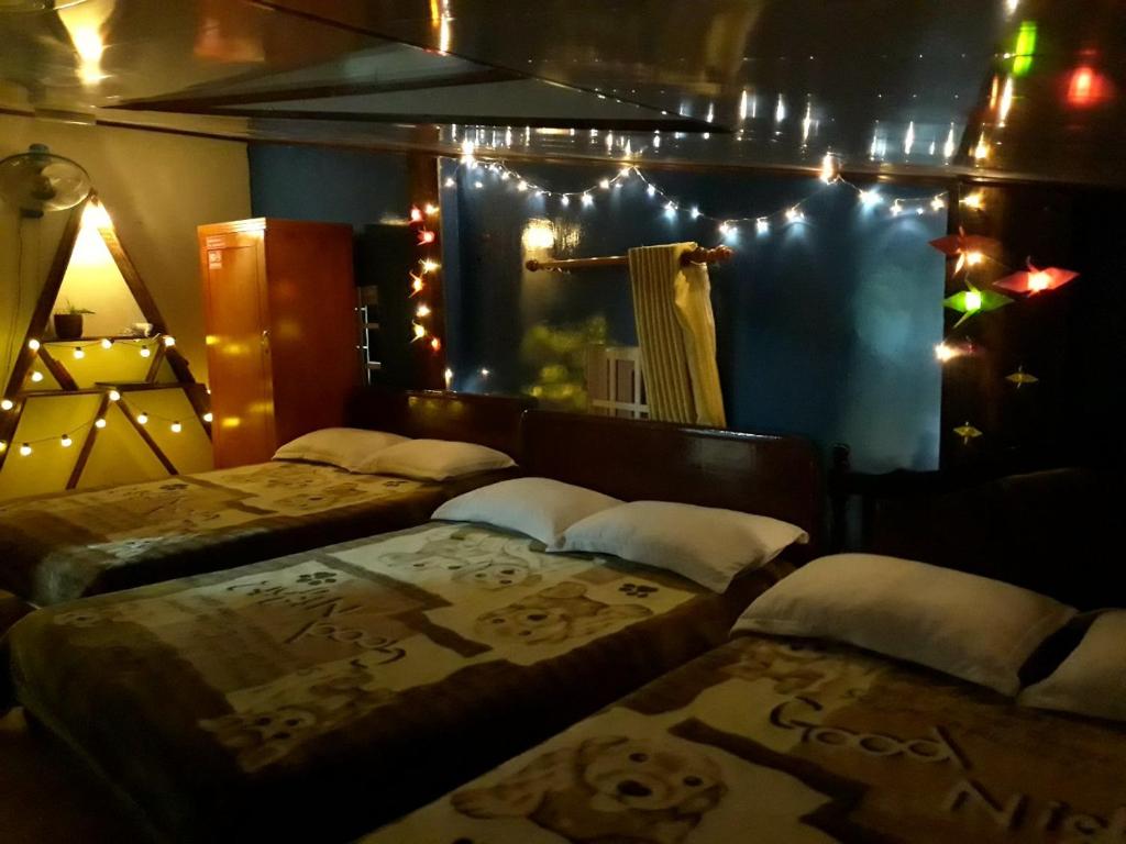 Postel nebo postele na pokoji v ubytování Bình Đào Hotel - Khách sạn ngay trung tâm giá rẻ