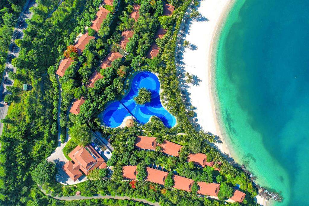 an aerial view of a resort next to the ocean at Vinpearl Luxury Nha Trang in Nha Trang