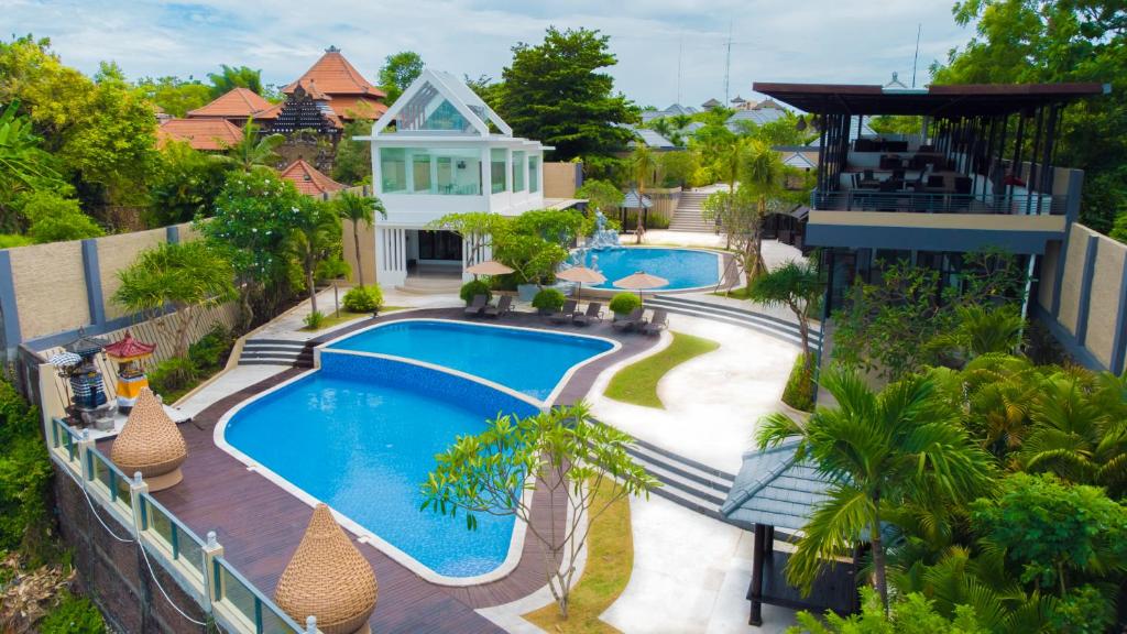 an aerial view of a house with a swimming pool at Luxotic Private Villa and Resort in Nusa Dua