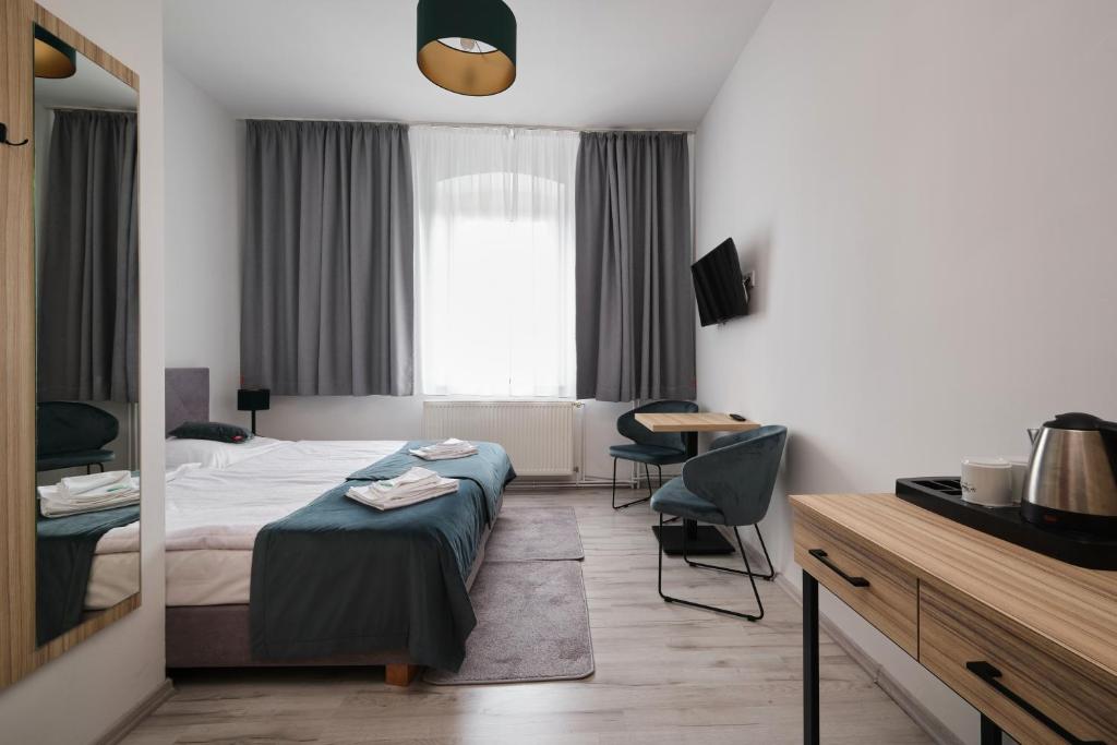 Posteľ alebo postele v izbe v ubytovaní Dobrzyński Resort Hotel Nefryt