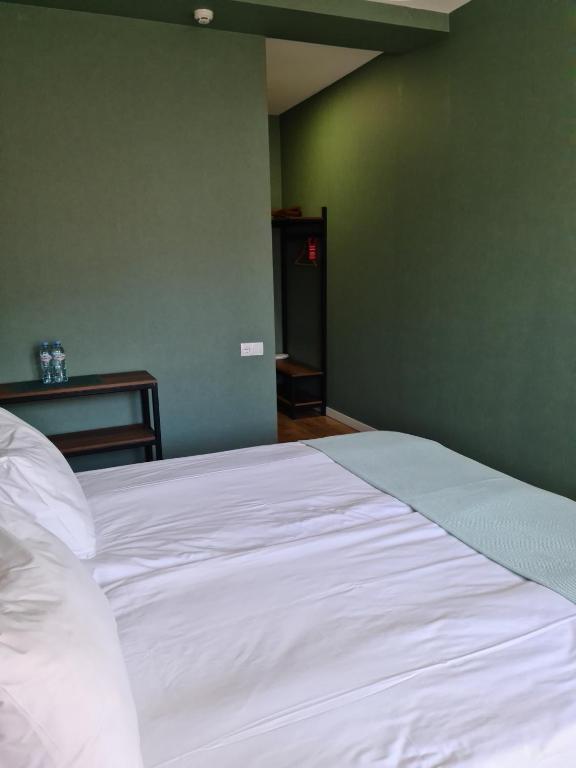 Letto o letti in una camera di Hilltop Kazbegi