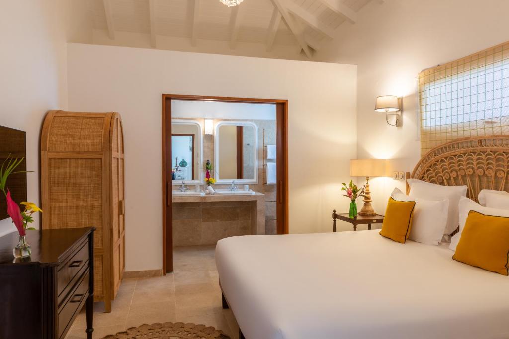 Postel nebo postele na pokoji v ubytování Habitation Saint Charles - Hôtel de Charme & Spa