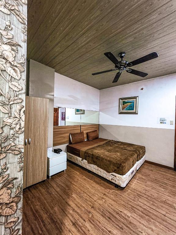 Postel nebo postele na pokoji v ubytování Hotel Urban